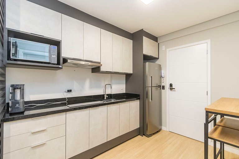 Apartamento de 1 Quarto com Vaga - FAI1211